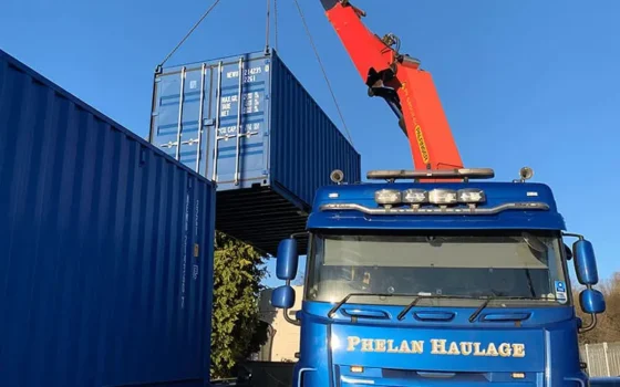 shipping container being delivered